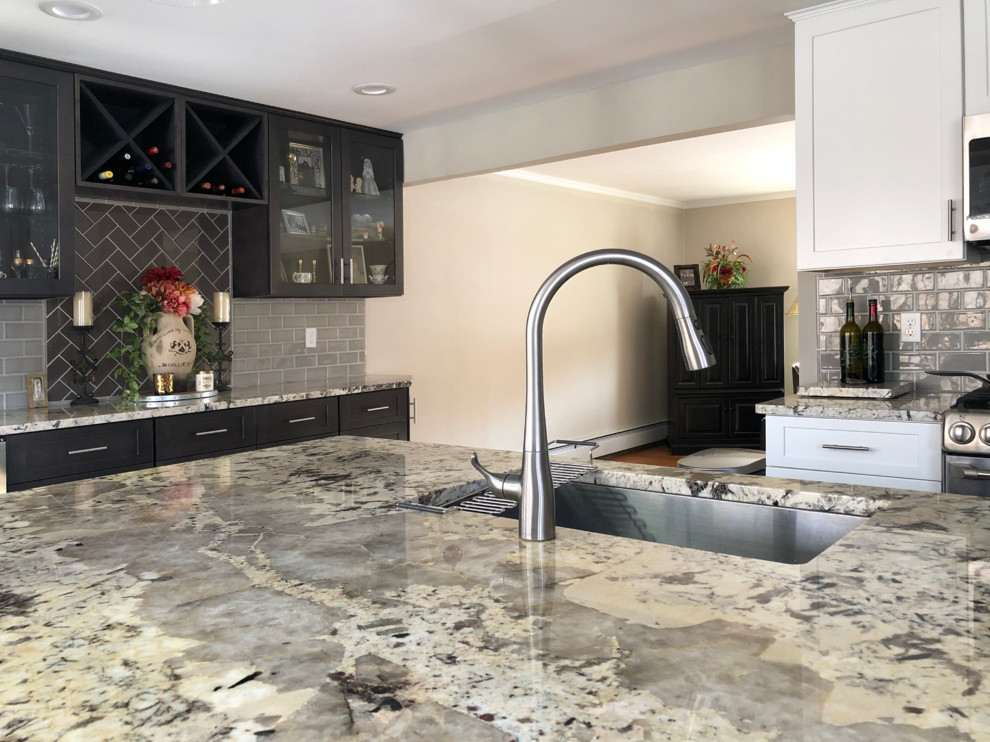 Example of a large eclectic u-shaped porcelain tile and multicolored floor eat-in kitchen design with an undermount sink, shaker cabinets, gray cabinets, quartzite countertops, gray backsplash, subway tile backsplash, stainless steel appliances and an island