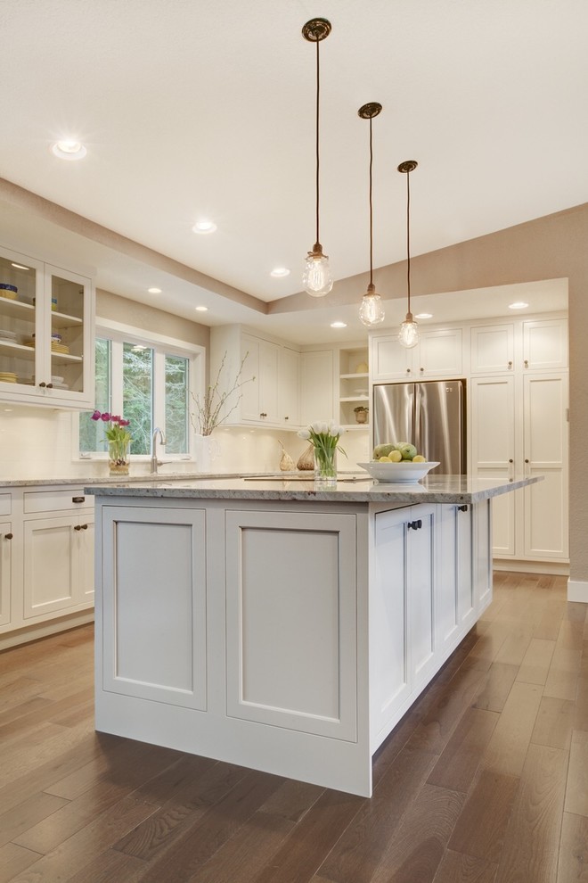 Example of a transitional kitchen design in Seattle