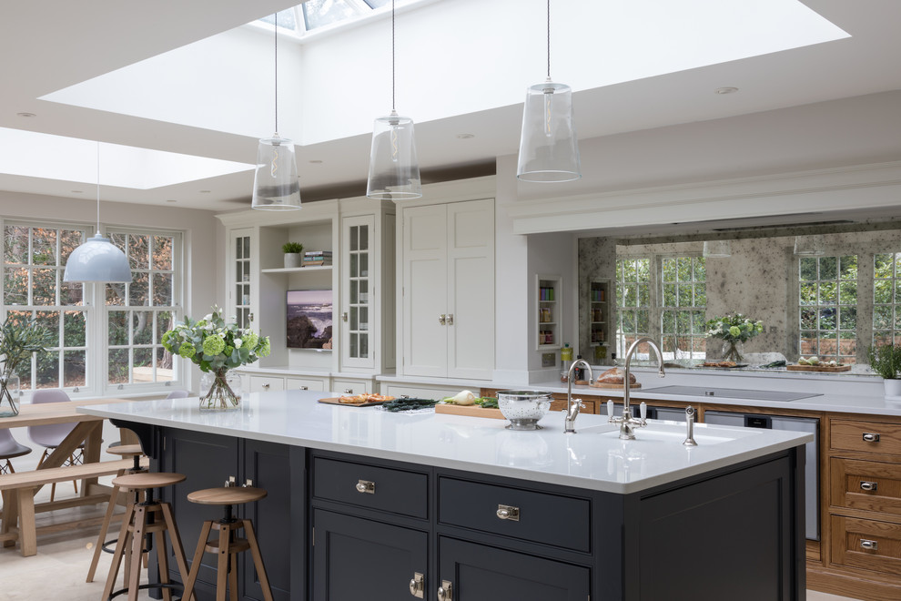 This is an example of a medium sized classic kitchen in Surrey.