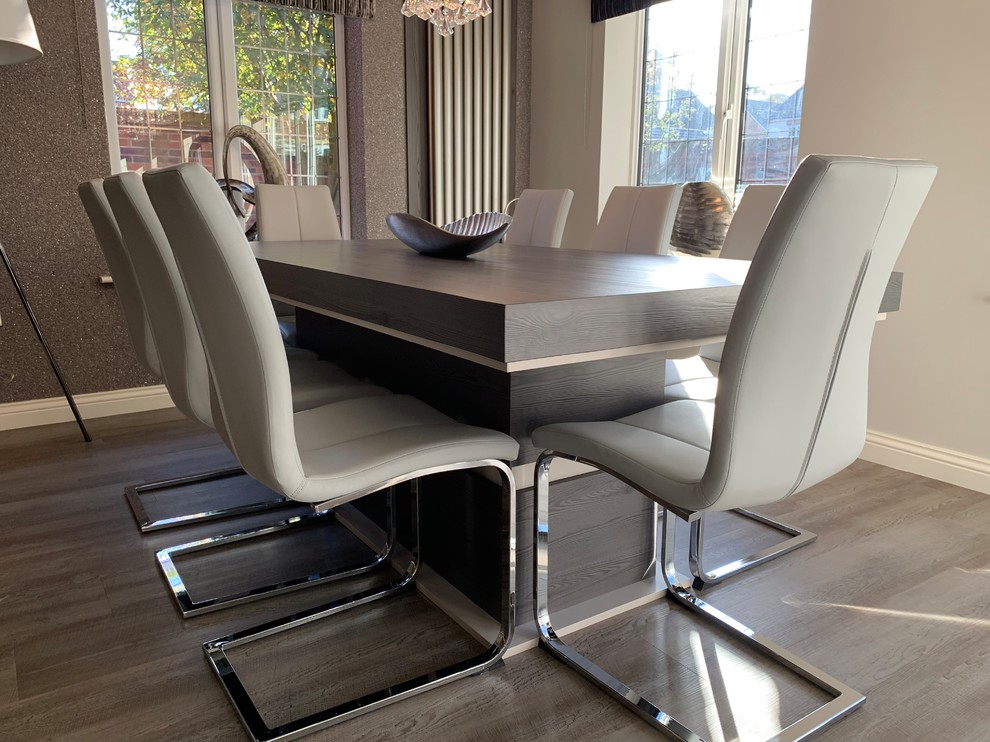 Medium sized contemporary open plan dining room in Other with vinyl flooring.