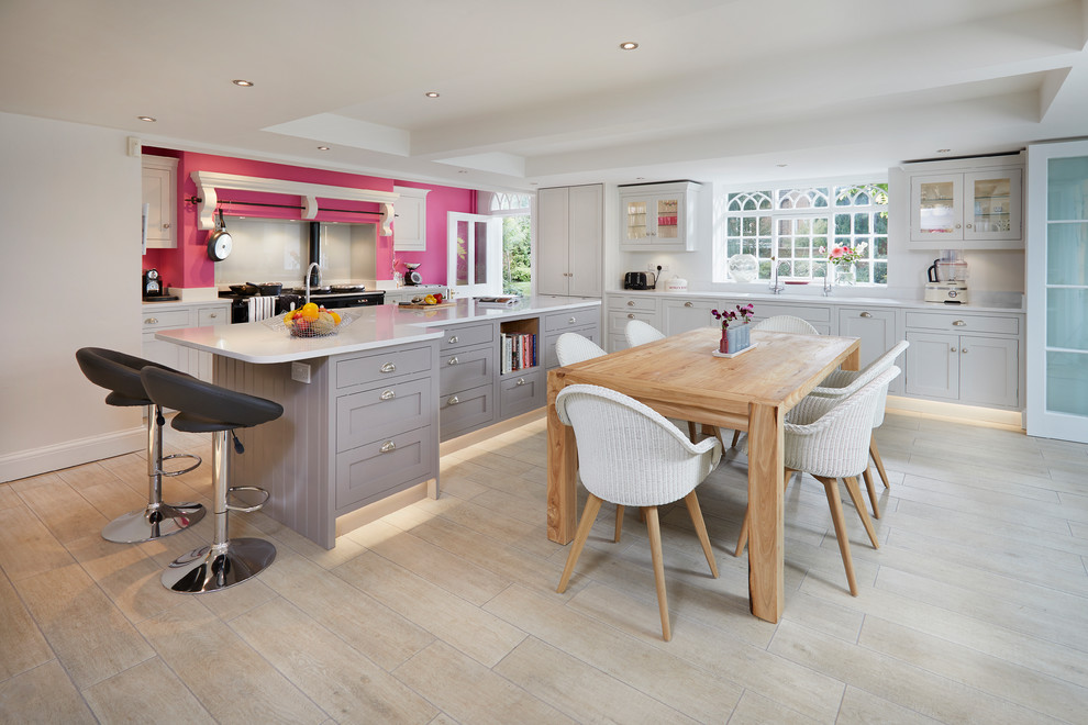 Inspiration for an expansive contemporary l-shaped open plan kitchen in Other with an integrated sink, shaker cabinets, grey cabinets, quartz worktops, white splashback, stainless steel appliances, porcelain flooring, an island, beige floors and white worktops.