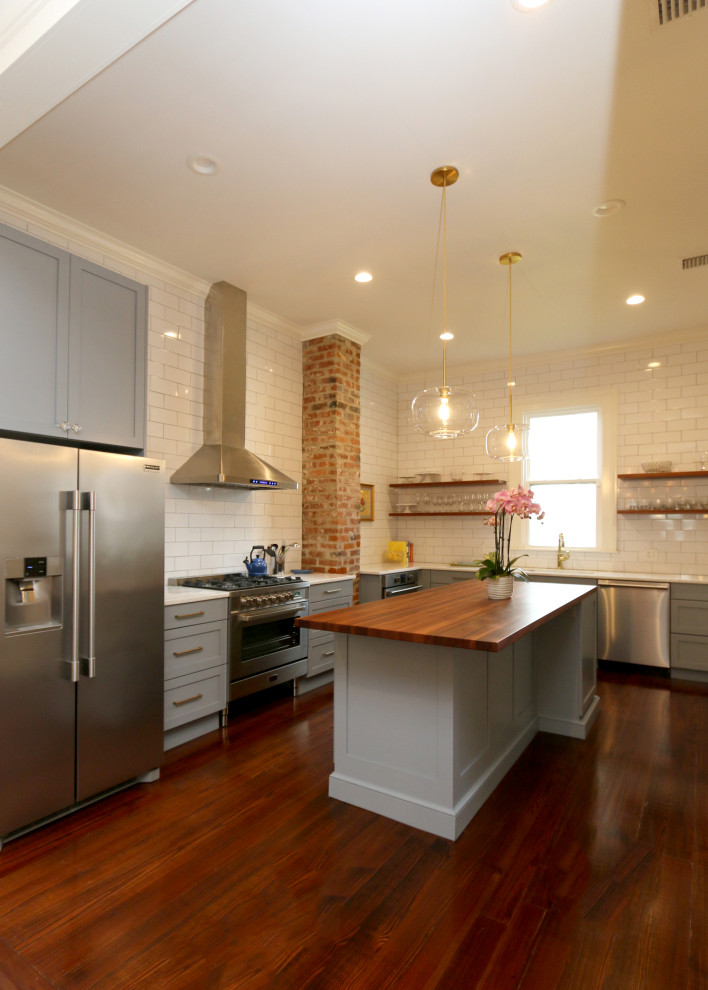 Open shelving and exposed brick are among the many details that the si Kitchen New