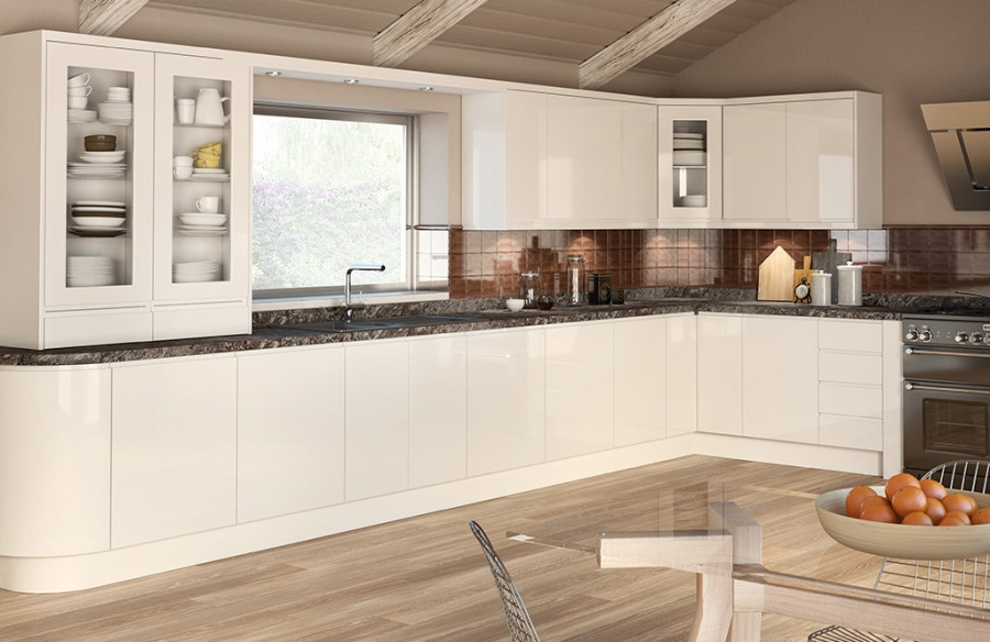 Immagine di una cucina abitabile minimal con ante beige