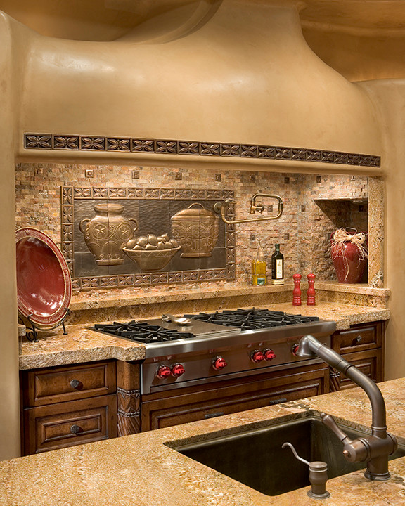 Large southwest galley eat-in kitchen photo in Phoenix with an undermount sink, recessed-panel cabinets, medium tone wood cabinets, limestone countertops, beige backsplash, stone tile backsplash, stainless steel appliances and an island