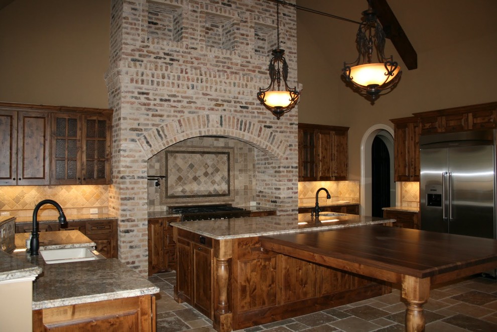 Large arts and crafts u-shaped ceramic tile open concept kitchen photo in Austin with an undermount sink, raised-panel cabinets, medium tone wood cabinets, granite countertops, beige backsplash, ceramic backsplash, stainless steel appliances and an island