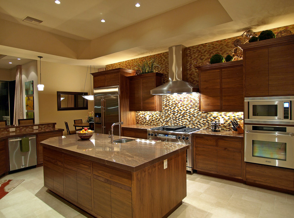 Example of a large classic u-shaped slate floor eat-in kitchen design in Las Vegas with a double-bowl sink, flat-panel cabinets, medium tone wood cabinets, granite countertops, multicolored backsplash, stone tile backsplash, stainless steel appliances and an island