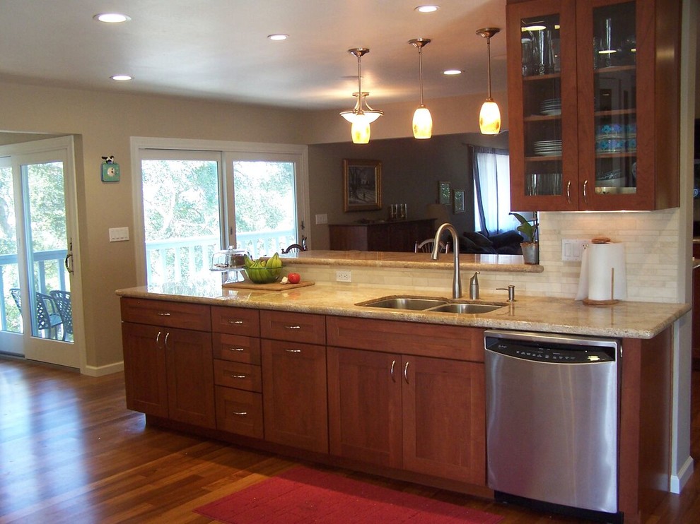 Design ideas for a classic kitchen in San Francisco with a double-bowl sink and medium wood cabinets.
