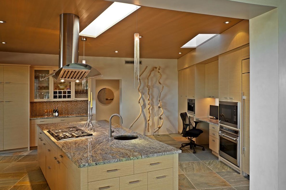 Large enclosed kitchen in Albuquerque with a single-bowl sink, flat-panel cabinets, light wood cabinets, brown splashback, stainless steel appliances and an island.