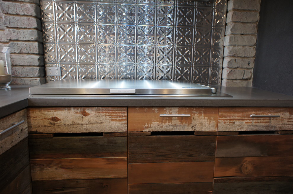 Outdoor Kitchen with Polished Concrete bench tops and Reclaimed Timber