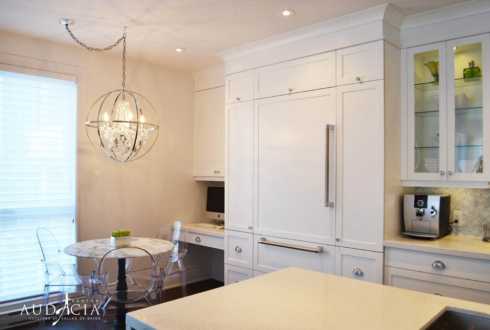 Medium sized contemporary l-shaped kitchen/diner in Montreal with shaker cabinets, white cabinets and an island.