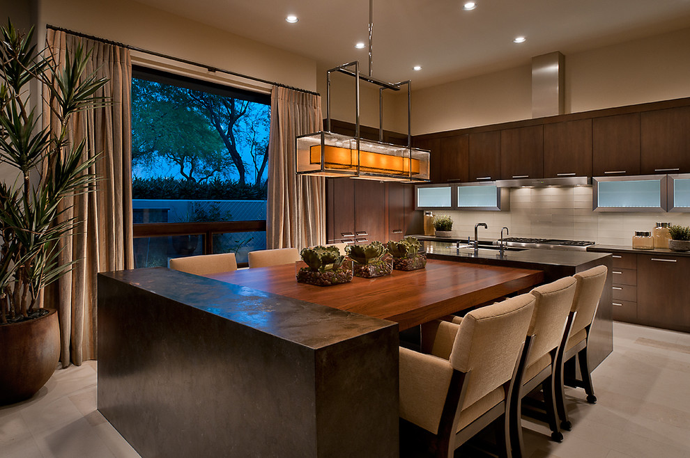 Inspiration for a contemporary ceramic tile eat-in kitchen remodel in Phoenix with flat-panel cabinets, dark wood cabinets, white backsplash and an island