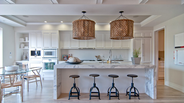 drum pendant lighting over kitchen island