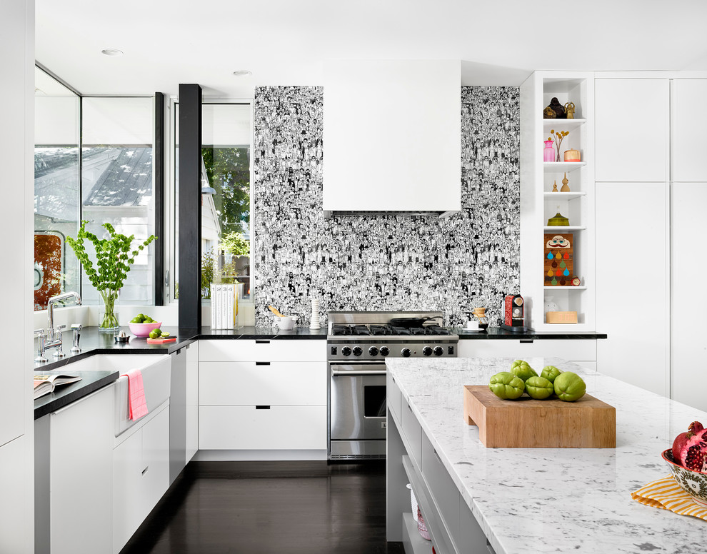 Inspiration for a contemporary kitchen remodel in Austin with a farmhouse sink, flat-panel cabinets and white cabinets