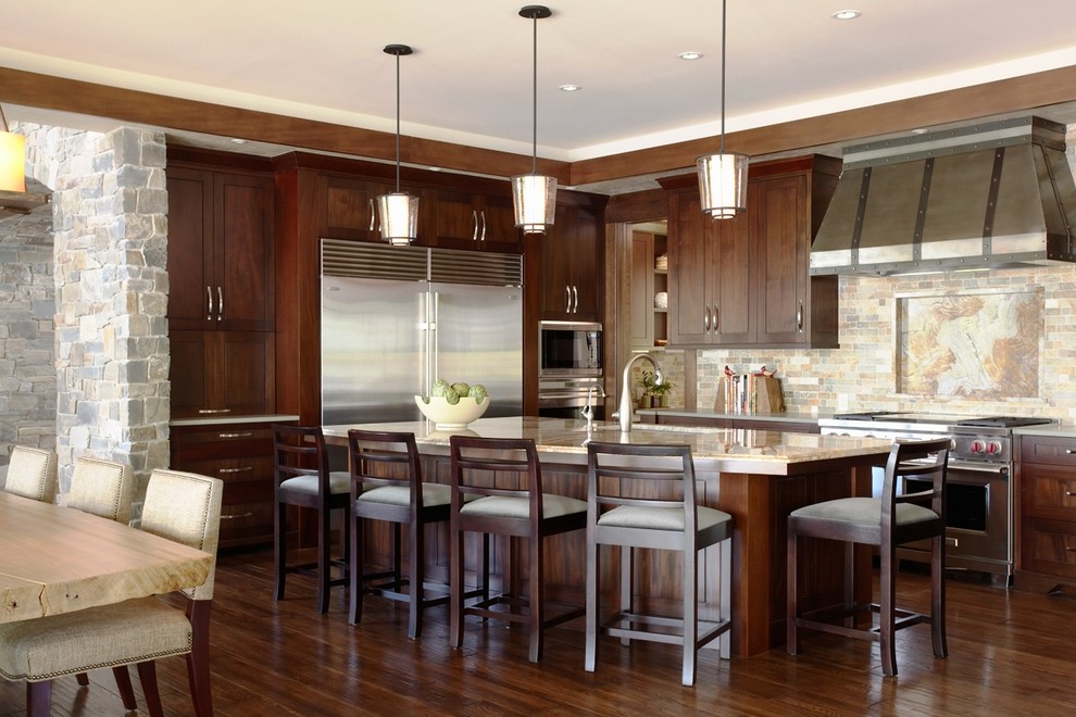Eat-in kitchen - contemporary eat-in kitchen idea in Minneapolis with shaker cabinets, dark wood cabinets, multicolored backsplash, stainless steel appliances and slate backsplash
