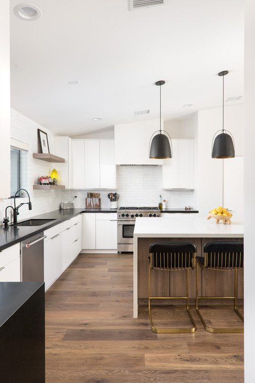 Achieve Modernity with White Cabinet Ideas Black Countertops and an Island with Black Appliances