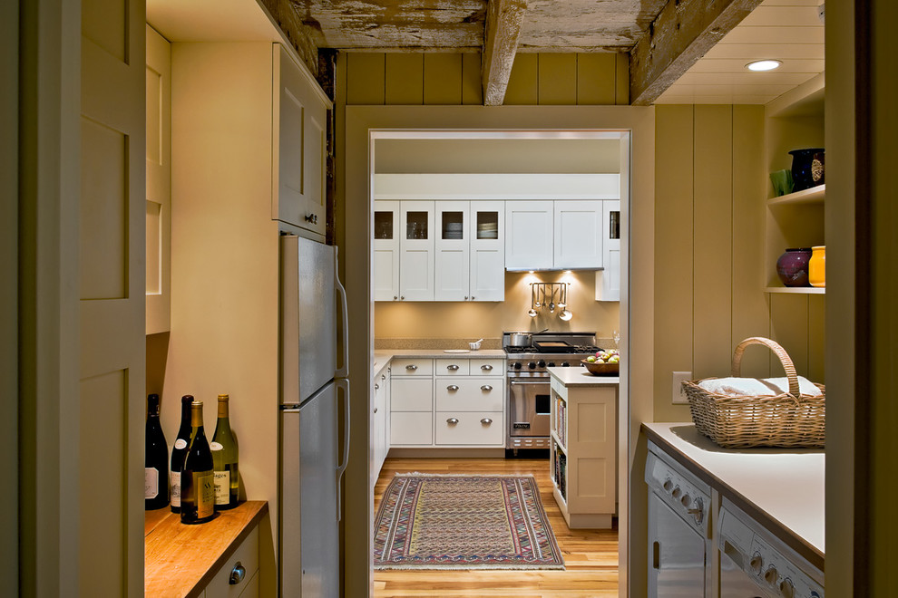 Design ideas for a rural kitchen in Portland Maine with stainless steel appliances.