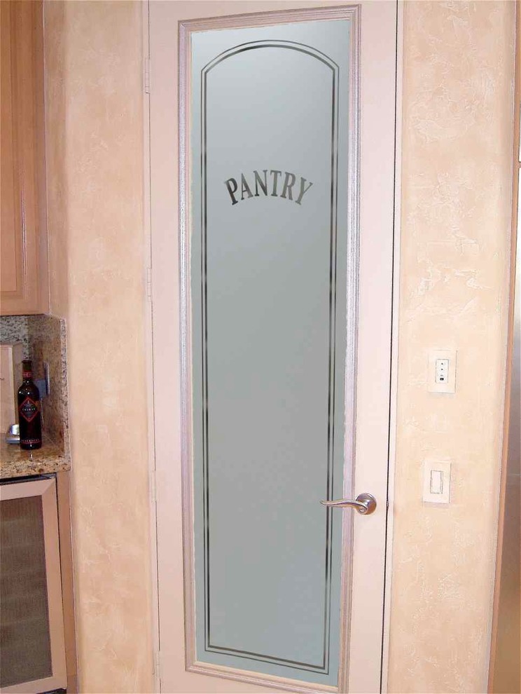Example of a mid-sized eclectic l-shaped kitchen pantry design in Other with raised-panel cabinets, medium tone wood cabinets, granite countertops, beige backsplash, ceramic backsplash, stainless steel appliances and an island
