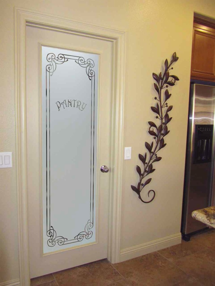 Inspiration for a mid-sized eclectic l-shaped kitchen pantry remodel in Other with raised-panel cabinets, medium tone wood cabinets, granite countertops, beige backsplash, ceramic backsplash, stainless steel appliances and an island