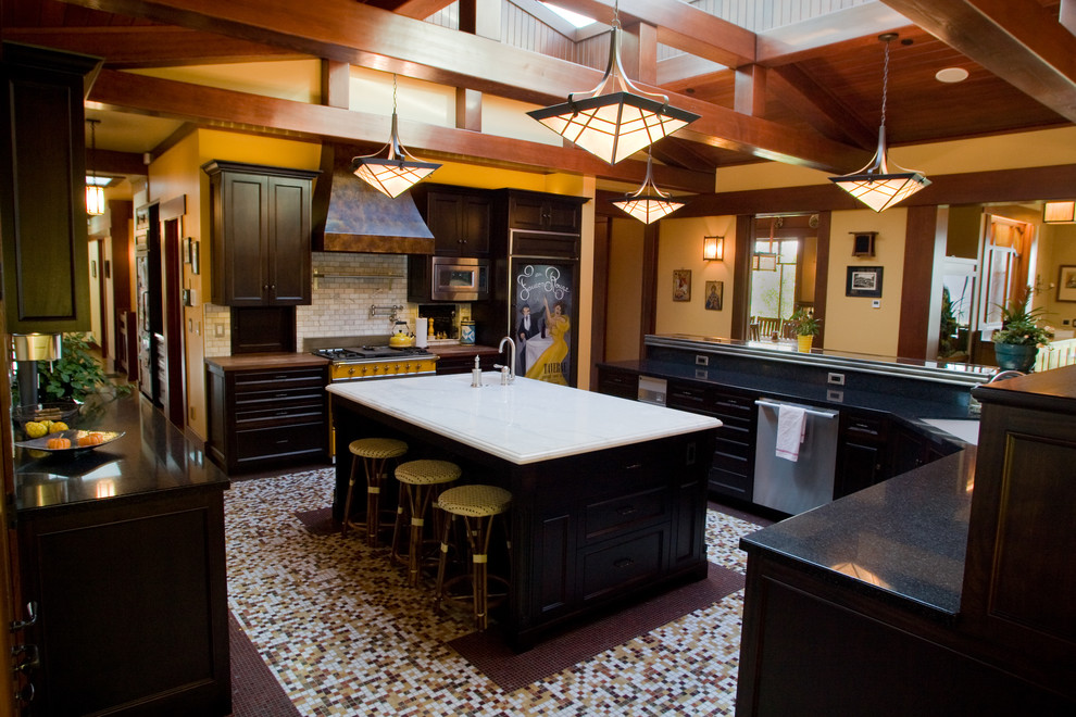 Example of a large eclectic u-shaped dark wood floor open concept kitchen design in San Francisco with a single-bowl sink, shaker cabinets, dark wood cabinets, zinc countertops, white backsplash, subway tile backsplash, paneled appliances and two islands