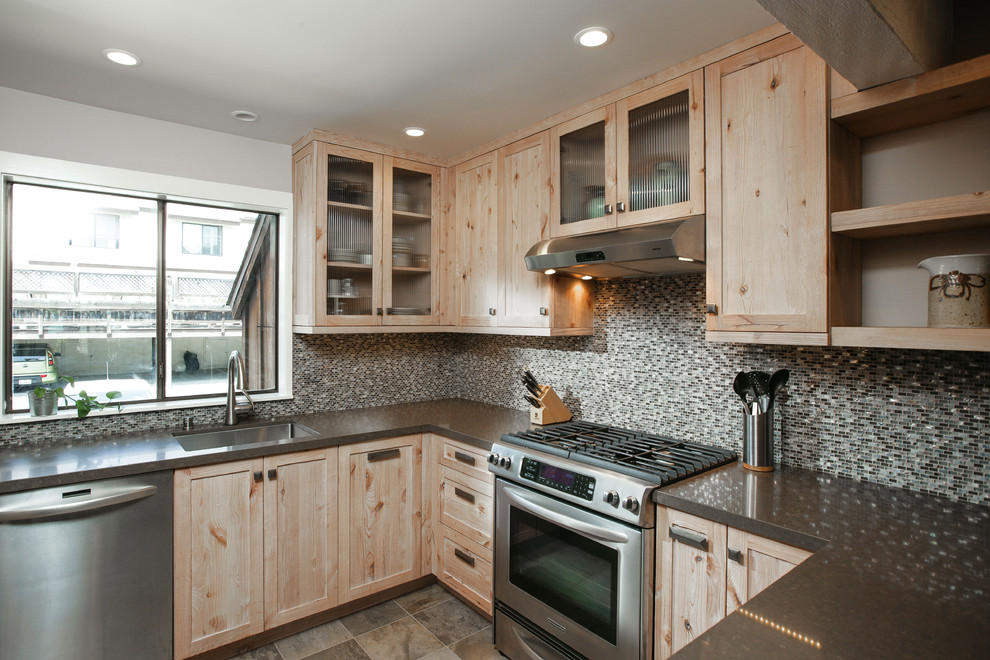 Example of a small mountain style l-shaped porcelain tile kitchen pantry design in San Francisco with an undermount sink, shaker cabinets, distressed cabinets, quartz countertops, multicolored backsplash, mosaic tile backsplash, stainless steel appliances and no island