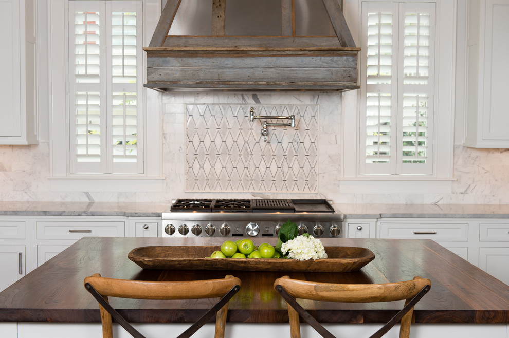 Design ideas for a classic kitchen in Charleston with shaker cabinets, white cabinets, multi-coloured splashback, stainless steel appliances and an island.