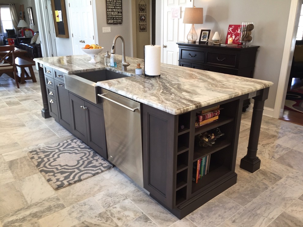 Inspiration for a large transitional l-shaped porcelain tile open concept kitchen remodel in Baltimore with a farmhouse sink, shaker cabinets, white cabinets, granite countertops, white backsplash, subway tile backsplash, stainless steel appliances and an island