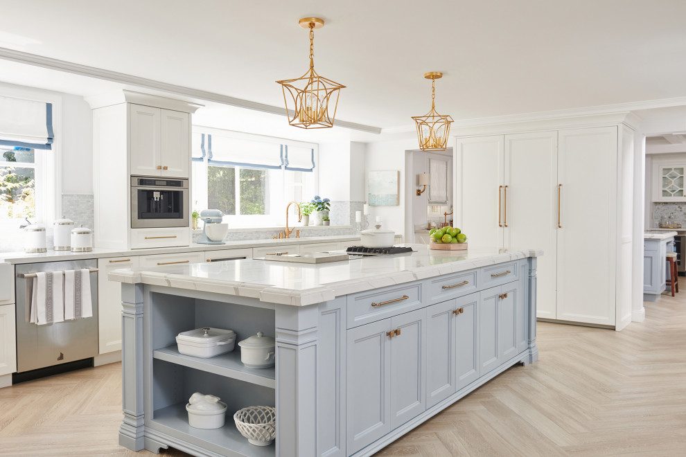 Example of a transitional porcelain tile and beige floor eat-in kitchen design in Los Angeles with beaded inset cabinets, white cabinets, quartz countertops, blue backsplash, marble backsplash, stainless steel appliances, white countertops and a drop-in sink
