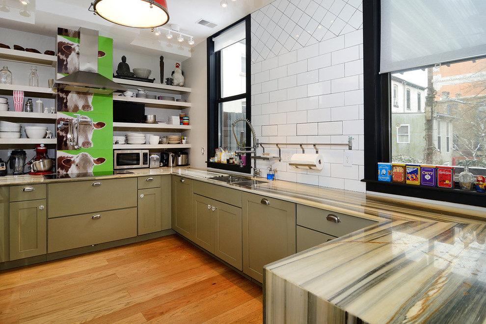 Bohemian u-shaped kitchen in New York with a double-bowl sink, open cabinets, white cabinets, white splashback, metro tiled splashback, stainless steel appliances and medium hardwood flooring.
