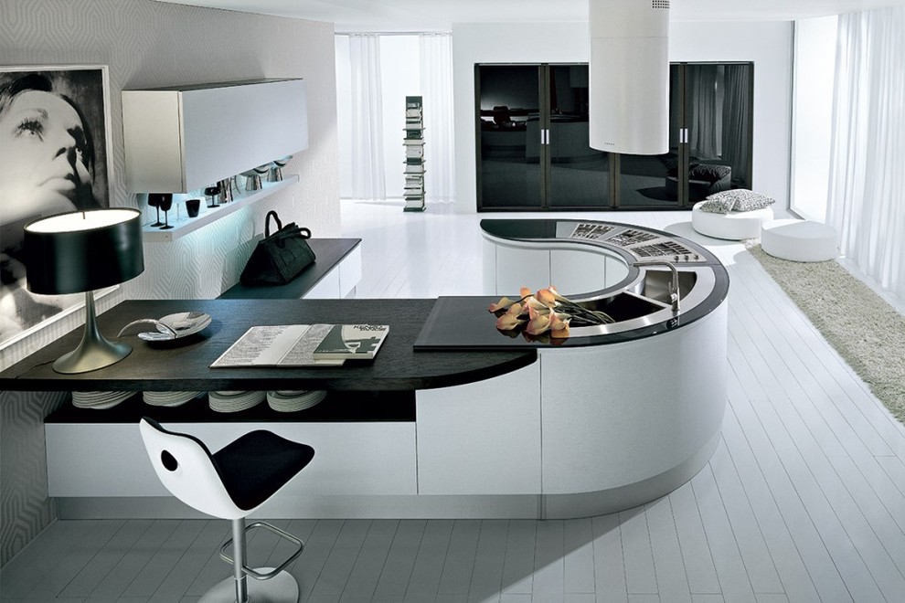 Eat-in kitchen - mid-sized contemporary u-shaped light wood floor eat-in kitchen idea in New York with a double-bowl sink, white cabinets, glass countertops, stainless steel appliances and an island