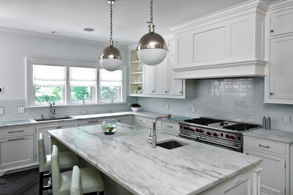 Ornate kitchen photo in New York with stainless steel appliances, subway tile backsplash, beaded inset cabinets, white cabinets and granite countertops