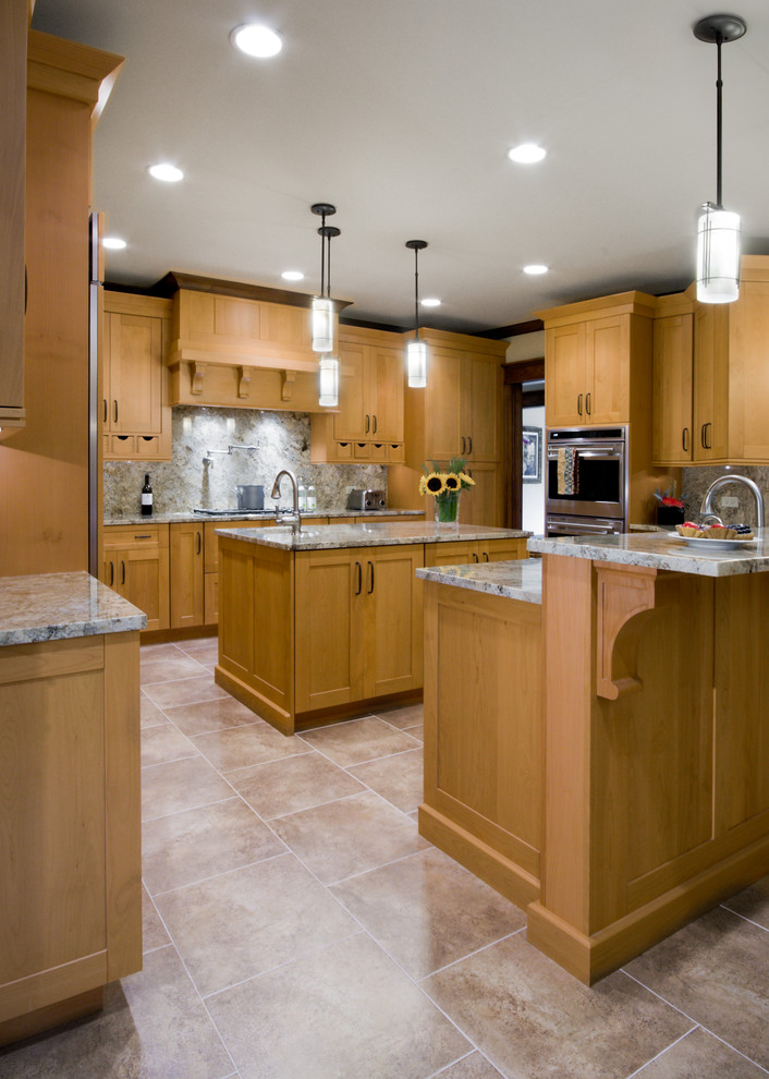 Example of a classic kitchen design in Chicago with granite countertops