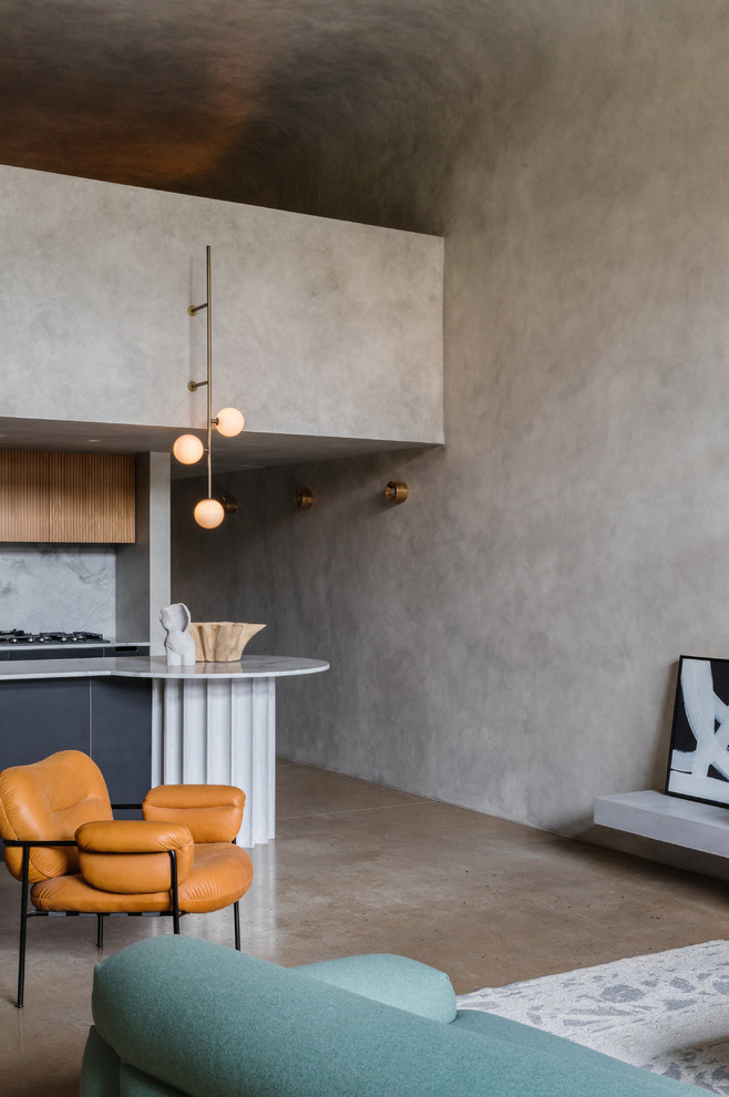 Ispirazione per una piccola cucina moderna con pavimento in cemento e pavimento grigio