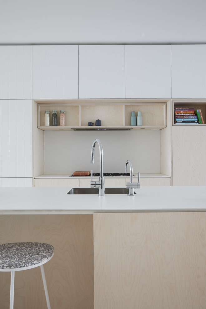 This is an example of a medium sized contemporary kitchen in Melbourne.