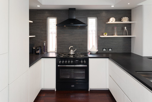 Contemporary White Cabinet Ideas Black Countertops and Dark Wood Flooring with Absolute Black Granite Countertop