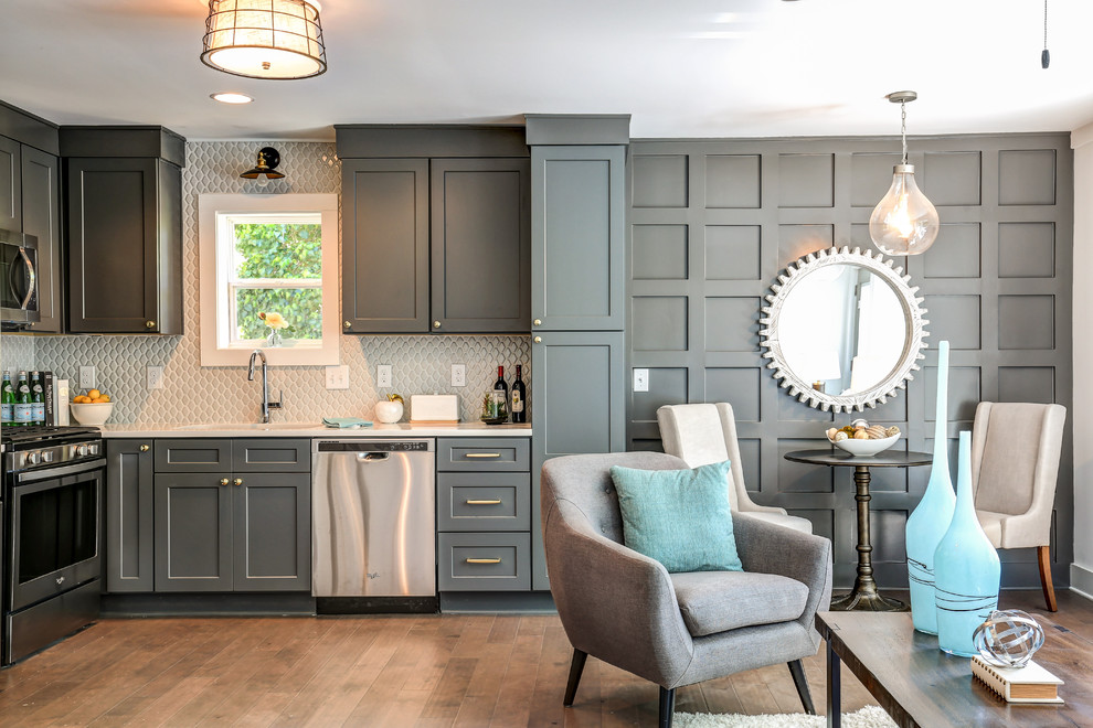 Small transitional open concept kitchen photo in Atlanta with shaker cabinets, gray cabinets, quartz countertops, gray backsplash, ceramic backsplash, stainless steel appliances and no island