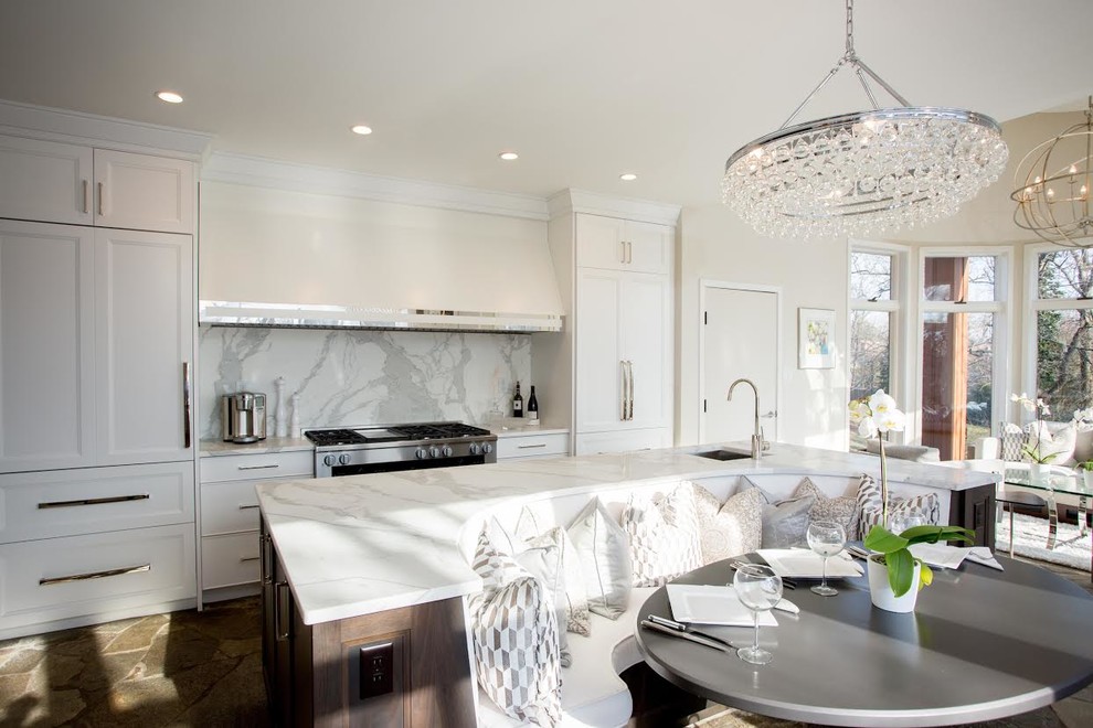 Inspiration for a large transitional galley slate floor and black floor eat-in kitchen remodel in Philadelphia with an undermount sink, flat-panel cabinets, white cabinets, marble countertops, white backsplash, marble backsplash, paneled appliances and no island