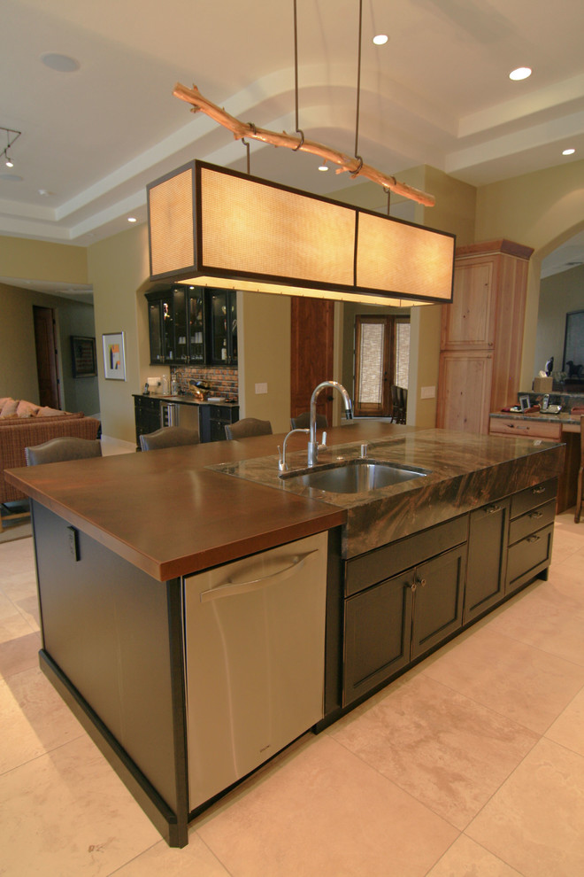 Example of a huge eclectic u-shaped travertine floor and beige floor eat-in kitchen design in Phoenix with an undermount sink, recessed-panel cabinets, black cabinets, copper countertops, multicolored backsplash, stainless steel appliances, an island and stone slab backsplash
