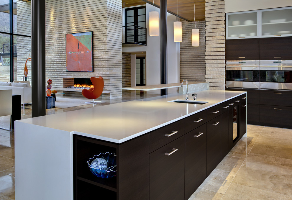 Photo of a contemporary open plan kitchen in Phoenix with stainless steel appliances and an island.