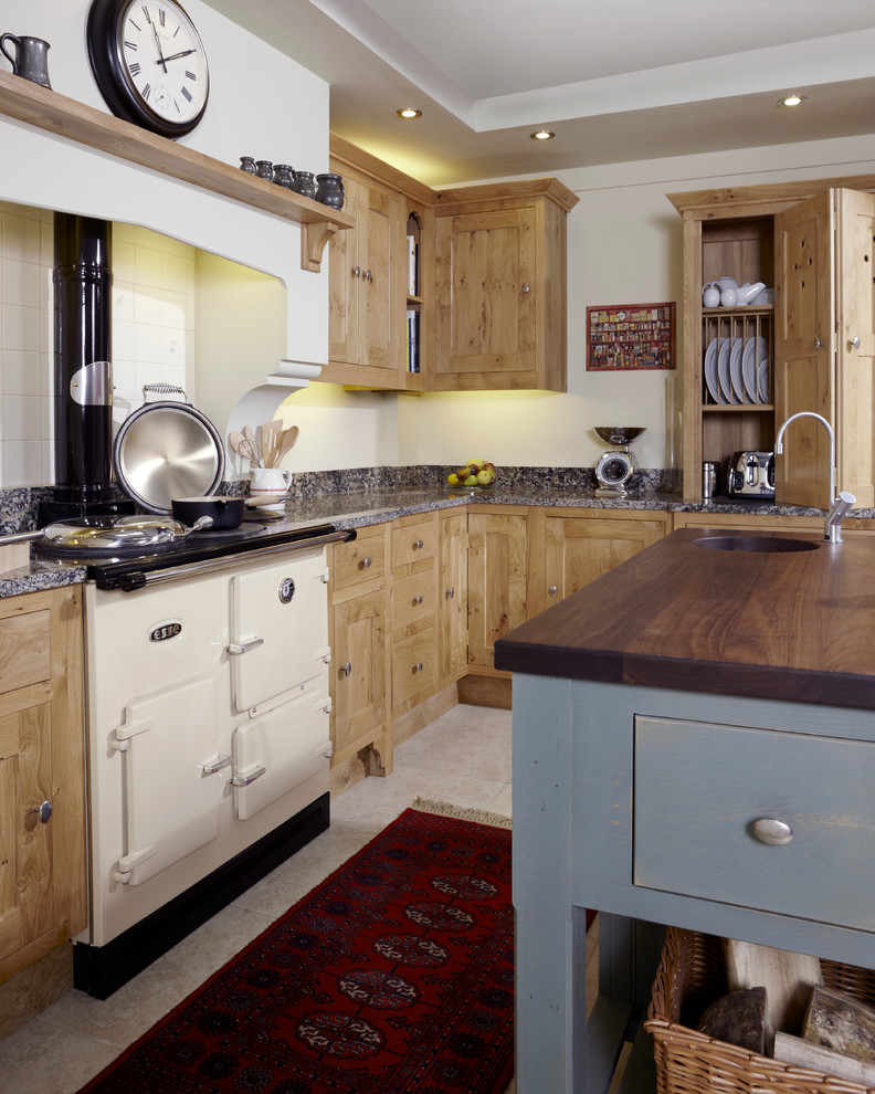Design ideas for a medium sized traditional l-shaped open plan kitchen in Other with a submerged sink, shaker cabinets, light wood cabinets, granite worktops, white splashback, ceramic splashback, coloured appliances, ceramic flooring and an island.