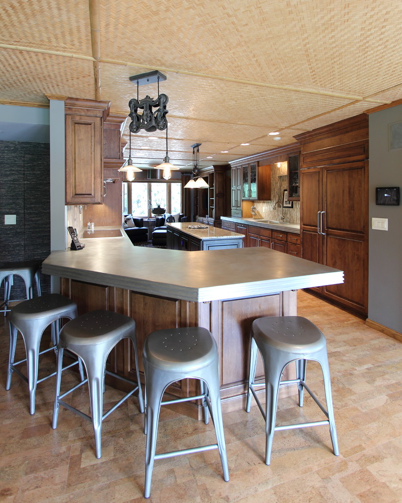 Large transitional cork floor kitchen photo in Other with raised-panel cabinets, medium tone wood cabinets, glass tile backsplash and an island