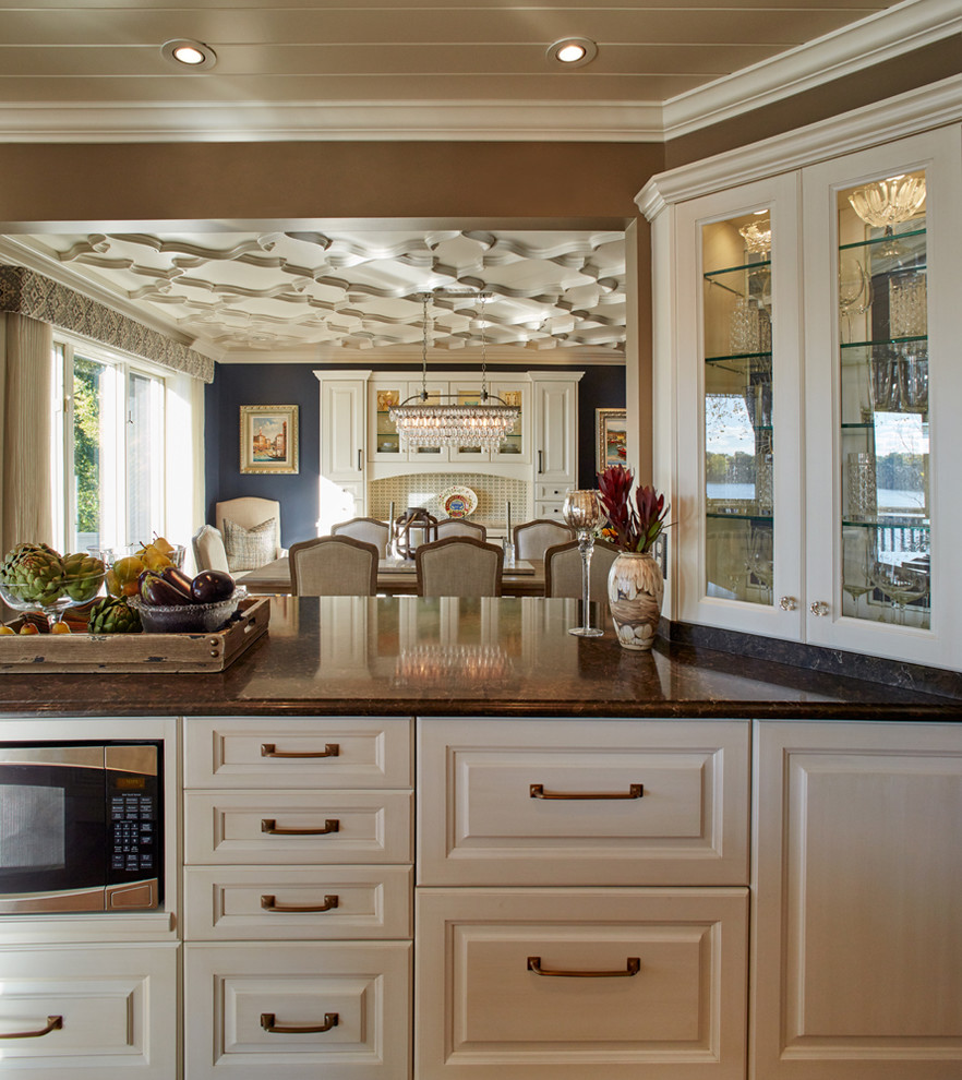 Inspiration for a traditional kitchen in Minneapolis with raised-panel cabinets, white cabinets and granite worktops.