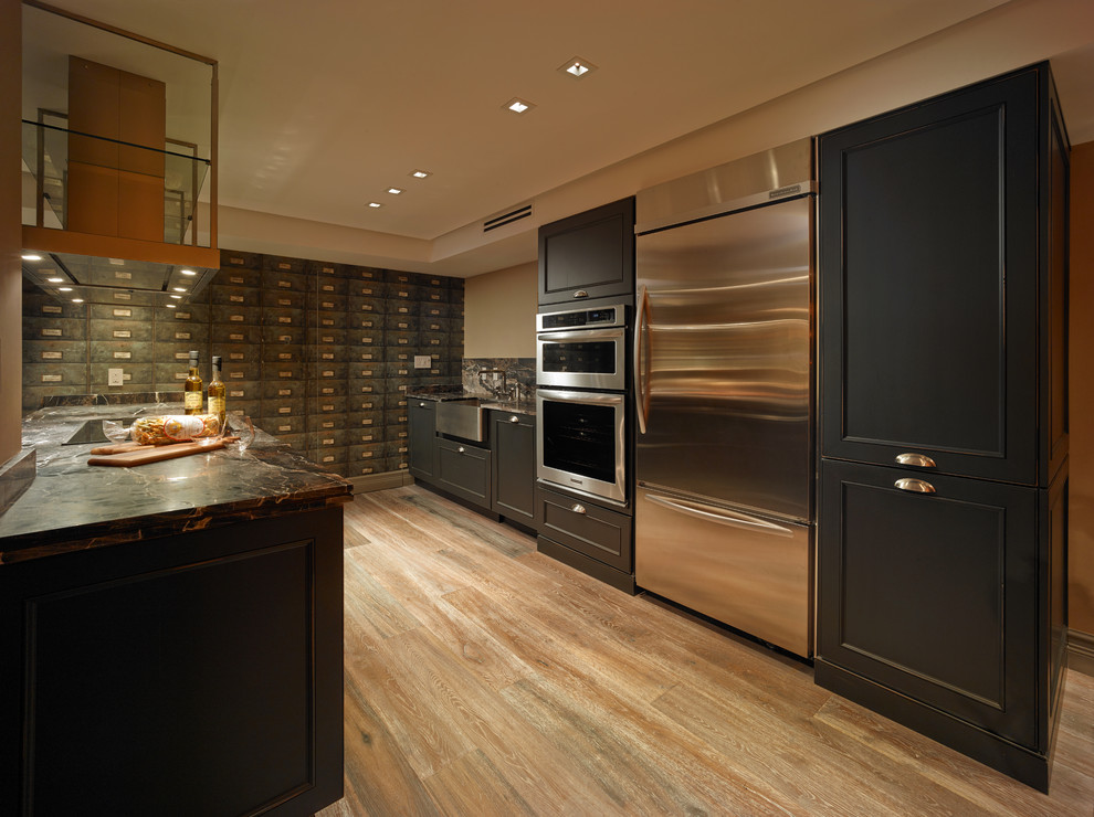 Kitchen - transitional kitchen idea in Miami with dark wood cabinets
