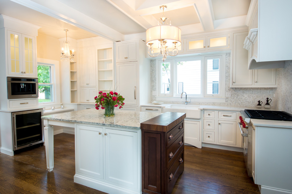 Inspiration for a timeless eat-in kitchen remodel in Chicago with beaded inset cabinets, white cabinets and an island