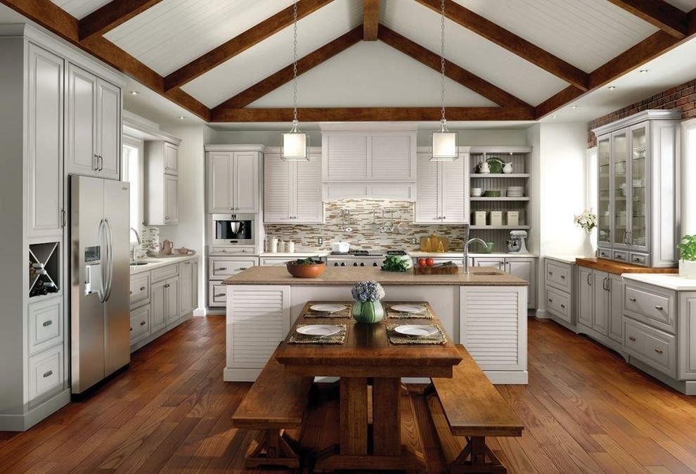 Inspiration for a large transitional u-shaped medium tone wood floor and brown floor open concept kitchen remodel in Tampa with an undermount sink, louvered cabinets, gray cabinets, gray backsplash, matchstick tile backsplash, stainless steel appliances, an island and quartz countertops