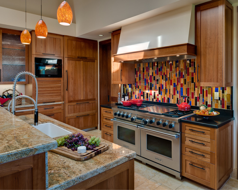 Inspiration for a large contemporary u-shaped ceramic tile open concept kitchen remodel in San Francisco with granite countertops, paneled appliances, shaker cabinets, medium tone wood cabinets, multicolored backsplash, mosaic tile backsplash, two islands and an undermount sink