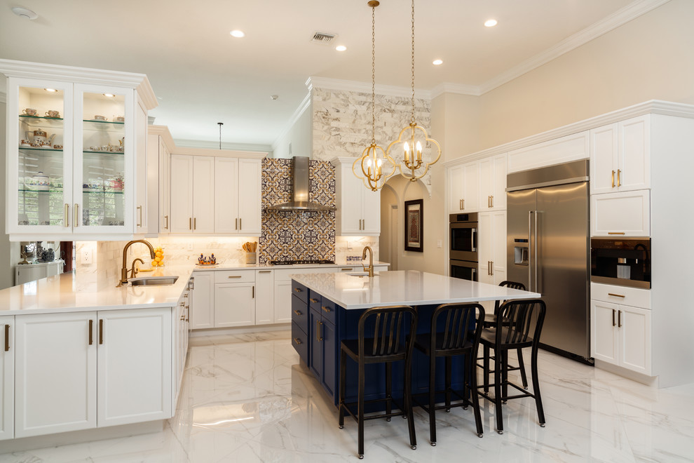 Eat-in kitchen - large contemporary u-shaped marble floor and white floor eat-in kitchen idea in DC Metro with a double-bowl sink, recessed-panel cabinets, white cabinets, quartz countertops, white backsplash, marble backsplash, stainless steel appliances, an island and white countertops