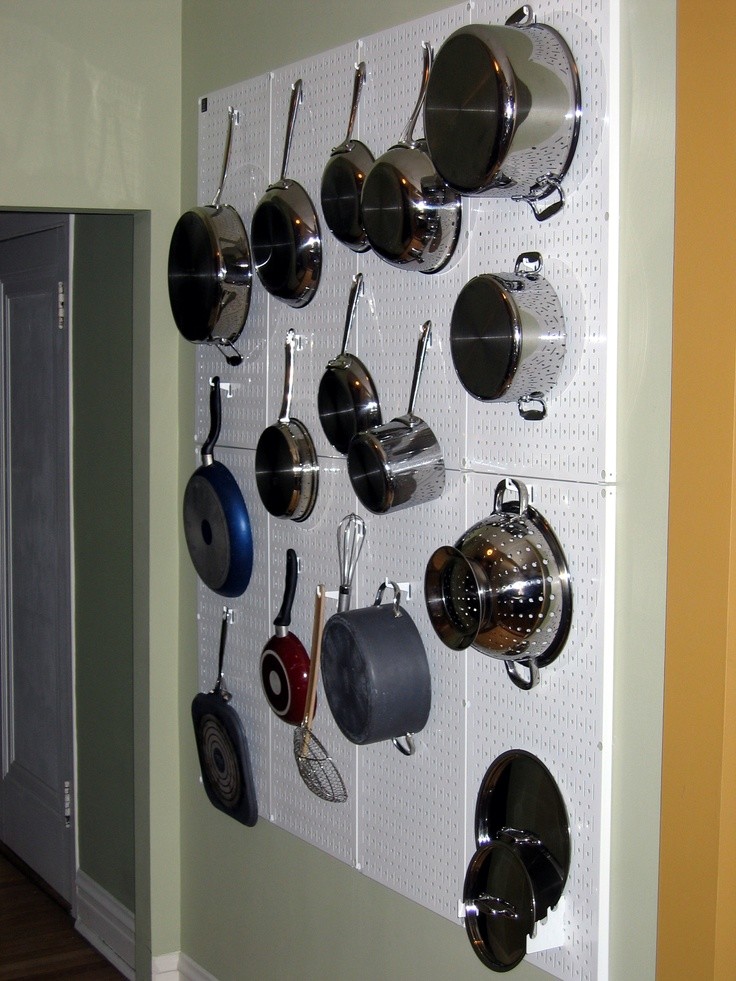Pots and pan storage and organization with Wall Control white metal