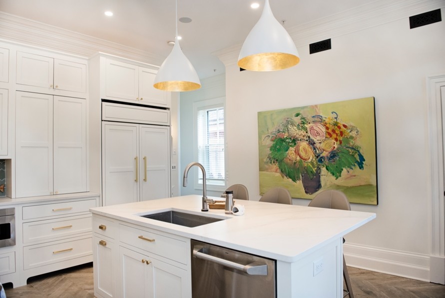 Example of a large trendy l-shaped cement tile floor and gray floor eat-in kitchen design in Baltimore with an undermount sink, shaker cabinets, white cabinets, quartzite countertops, green backsplash, mosaic tile backsplash, stainless steel appliances, an island and white countertops