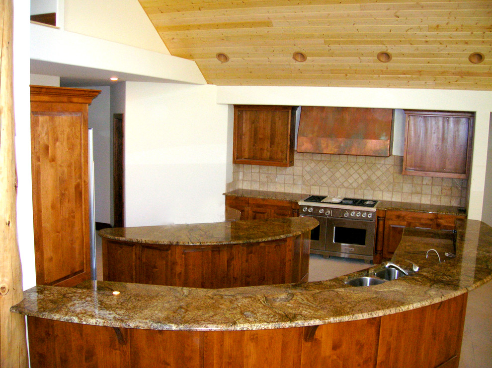 This is an example of a rustic kitchen in Seattle.