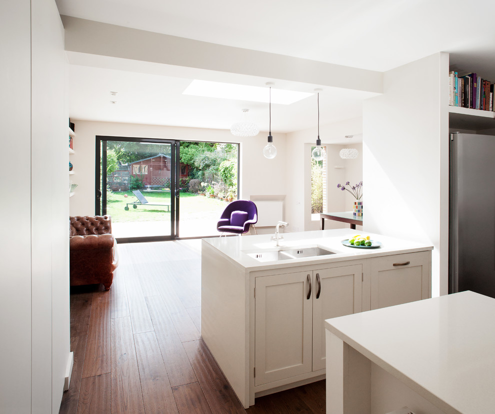 Photo of a medium sized contemporary kitchen in London with medium hardwood flooring.